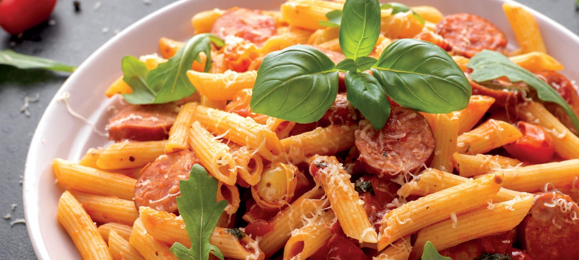 Italian Sausages with Cherry Tomatoes, GlutenFree Pasta, and Blush Sauce