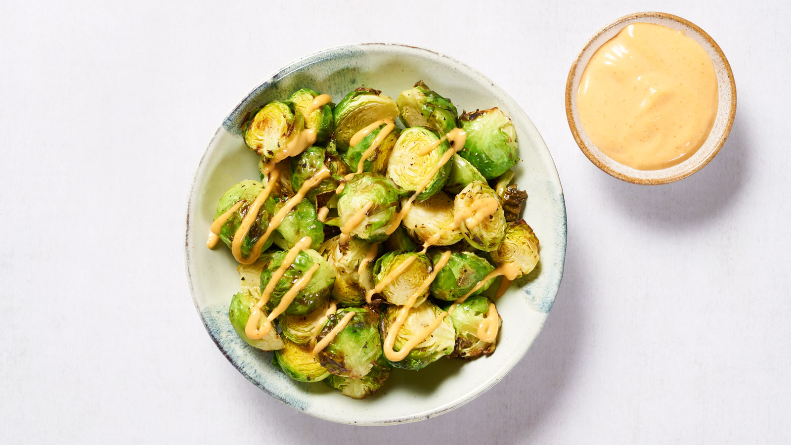 Crispy Brussel Sprouts with Sriracha Mayo –