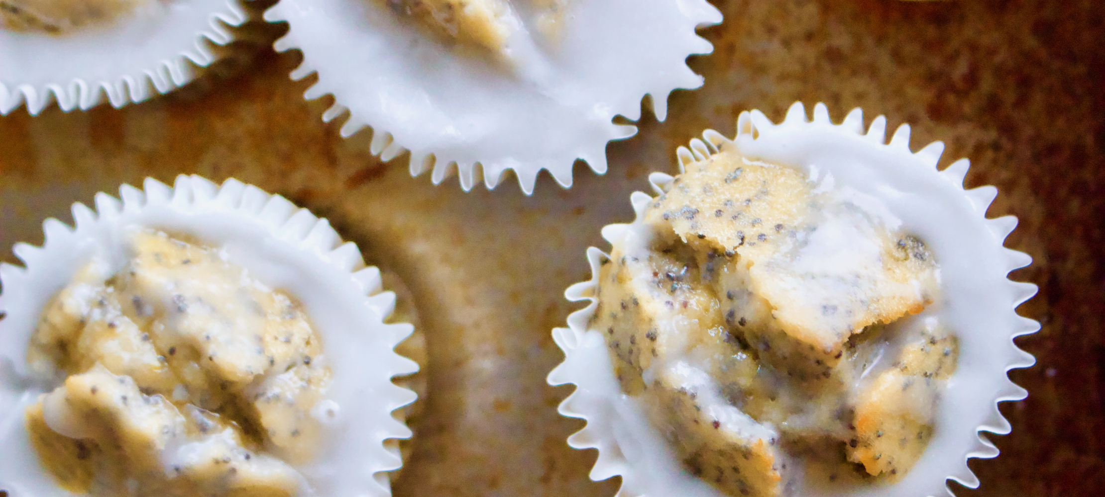 Lemon & Poppy Seed Glazed Muffins –