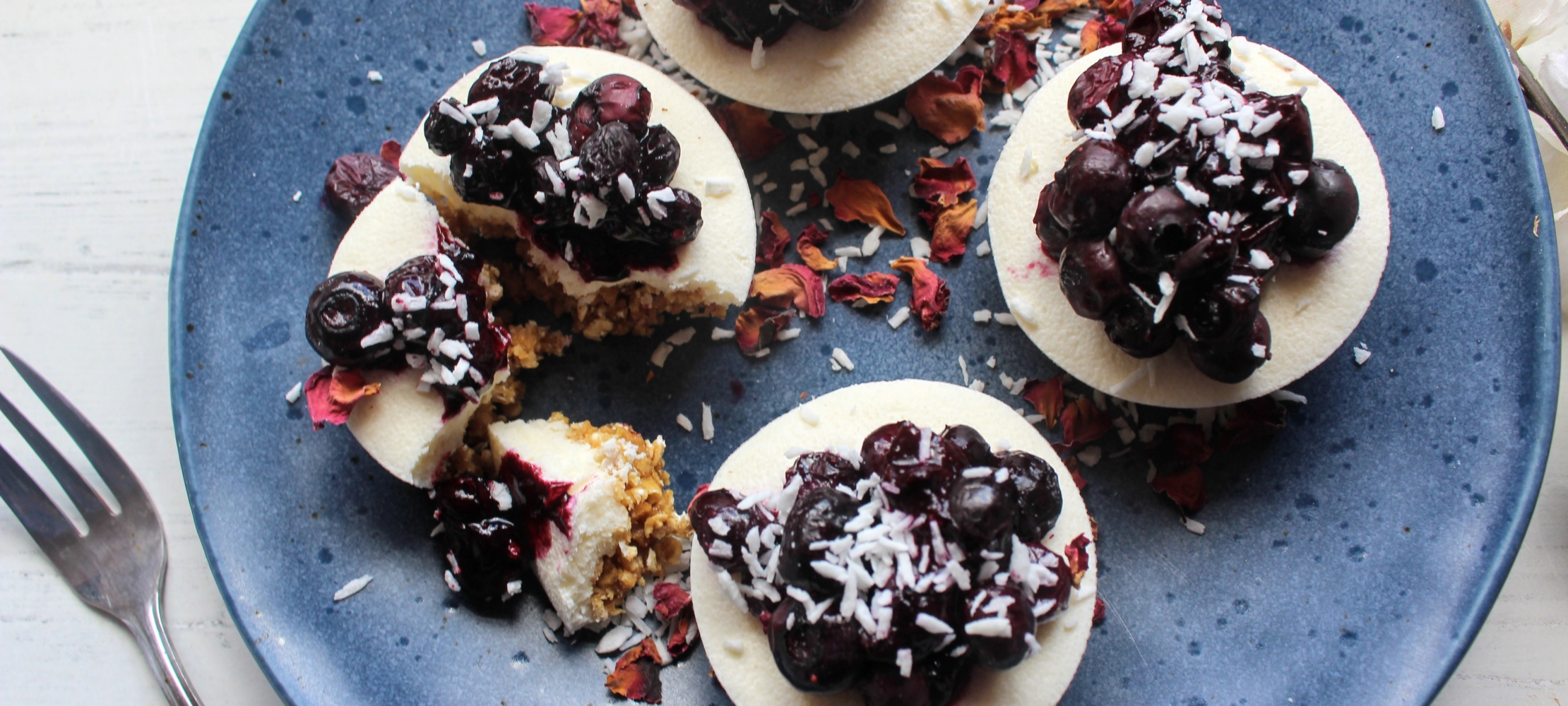 Blueberry Coconut Cheesecakes –