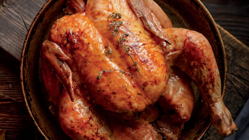 Overhead view of a whole roasted chicken