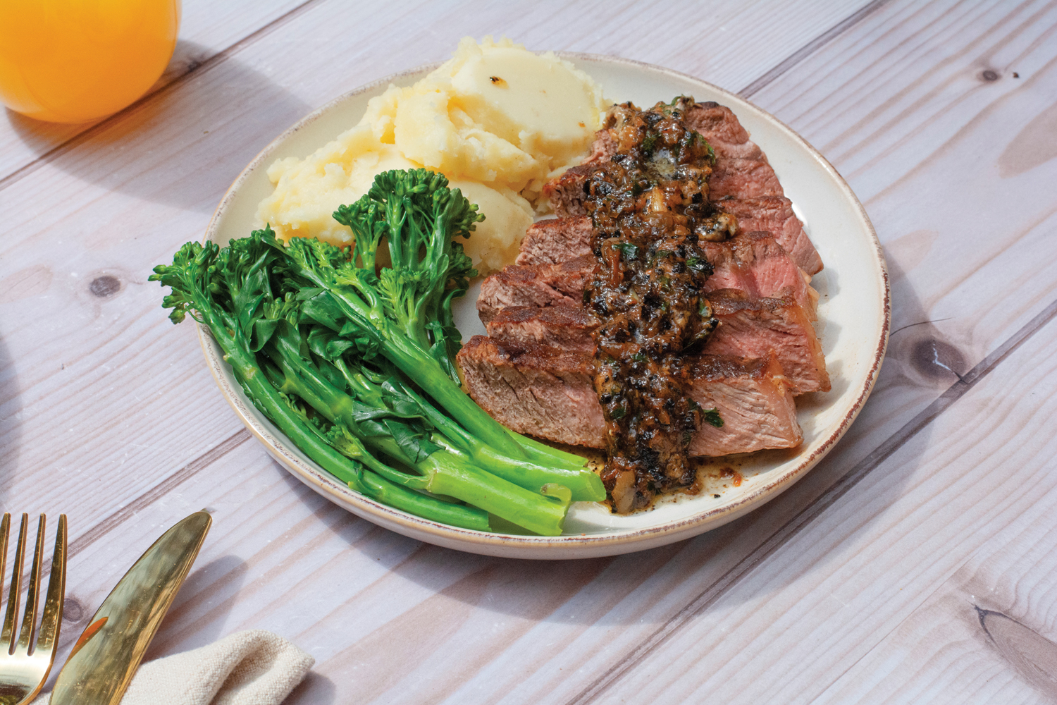 Seared Sirloin Steak with Caramelised Onion Butter –