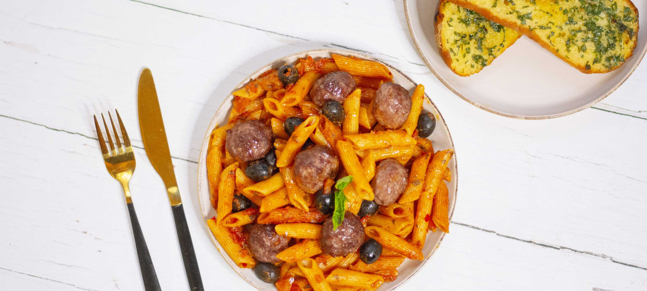 Tomato, Olive & Meatball Penne With Garlic Bread –