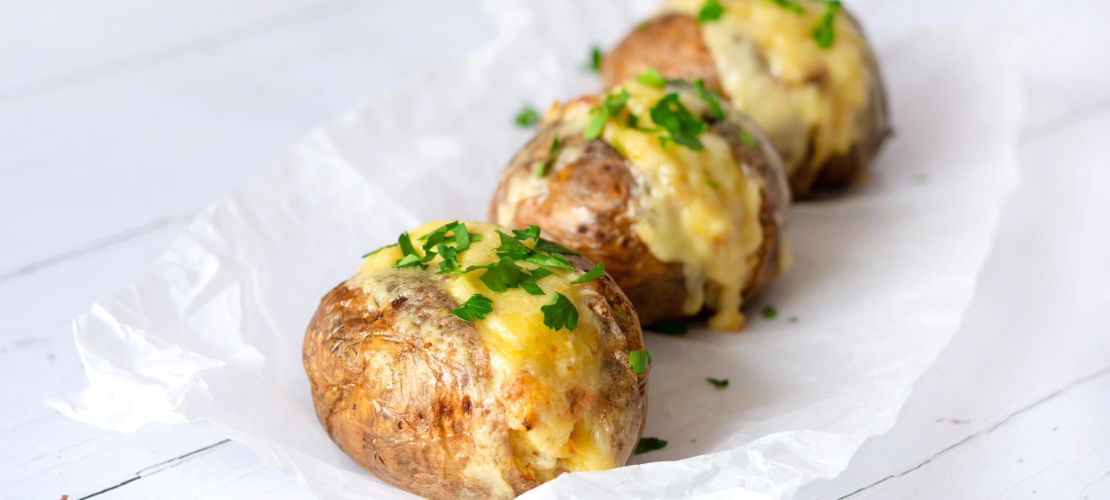 Cheesy Baked Potatoes –