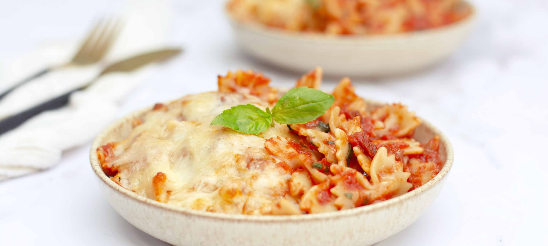 Cheesy Tomato Pasta Bake –
