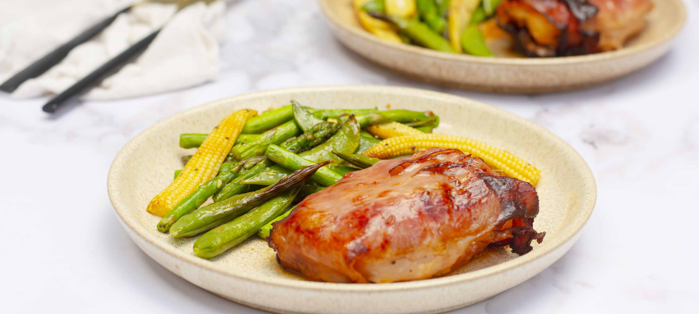 Prosciutto Red Pesto Cod with Baby Vegetables –